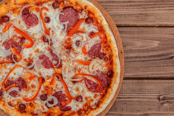 Pizza capricciosa traditional italian meal from prosciutto mushrooms artichokes egg parmesan olives.