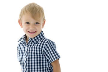 Little boy is playing with a soccer ball.