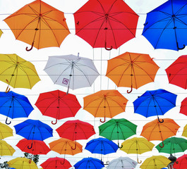 Fototapeta na wymiar Flying umbrellas
