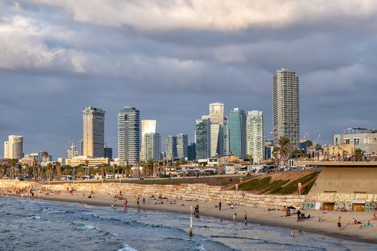 beach in tel aviv with hotels and people