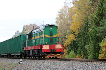 Obraz premium green locomotive in the forest