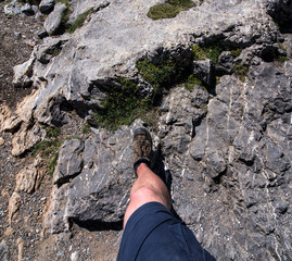 tourist walks on the rock