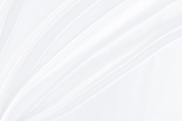White gray satin texture that is white silver fabric silk background with beautiful soft blur pattern natural.