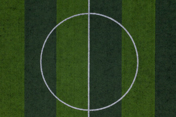 Obraz premium Center of soccer field, Striped soccer field background, Green grass soccer field background