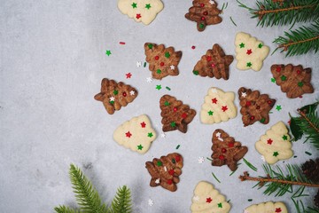 Homemade Christmas Spritz cookies on festive X'mas holiday frame