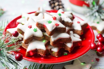 Christmas frosted star cookies on festive holiday background