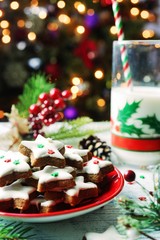 Christmas frosted star cookies on festive holiday background