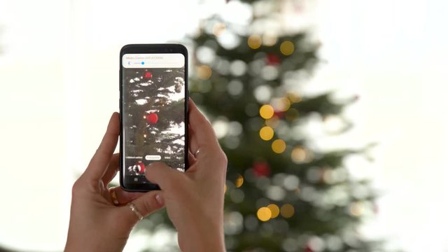 shooting with zooming on a smartphone Christmas tree and decoration
