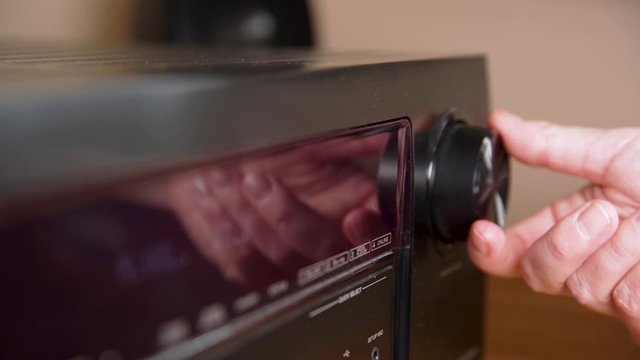 control the function on the black amplifier using the buttons and the scroll wheel