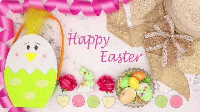 Happy Easter title appear on marble background surrounded with Easter decoration - Stop motion 