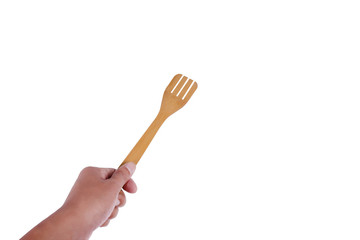 Man hand holding wooden spatula isolated on white background