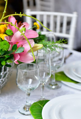 elegant table setting, glass goblets, water and wine glasses, banquet