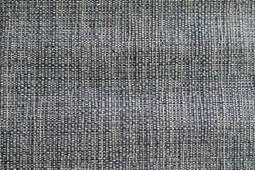 Gray fiber canvas macro pattern texture.