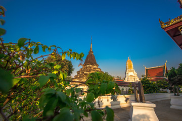 The blurred nature background of the green rice fields, and a seat to watch the scenery, a wooden bridge for taking pictures while traveling