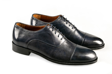 pair of black shoes isolated on white background