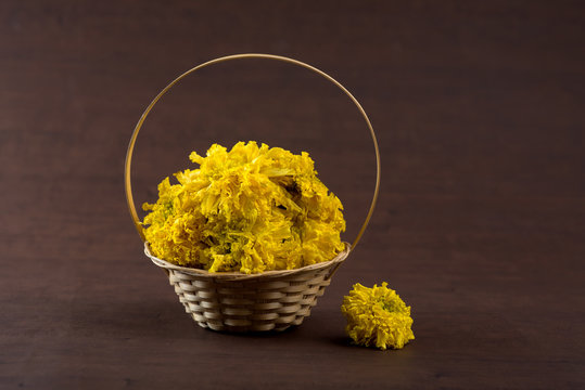 Marigold (Zendu Flowers) flowers in a bamboo basket.