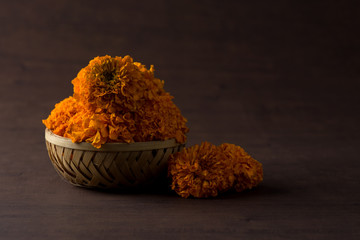 Marigold (Zendu Flowers) flowers in a bamboo basket.