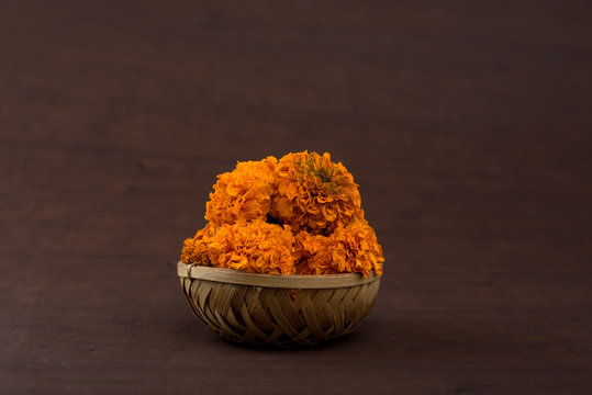 Marigold (Zendu Flowers) flowers in a bamboo basket.