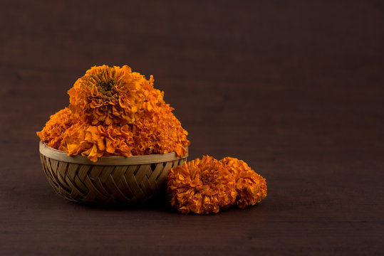 Marigold (Zendu Flowers) flowers in a bamboo basket.