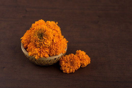 Marigold (Zendu Flowers) flowers in a bamboo basket.