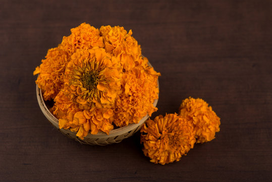 Marigold (Zendu Flowers) flowers in a bamboo basket.