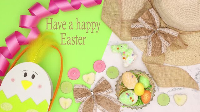 Have a happy Easter title appear on marble background with green and pink Easter decoration - Stop motion 