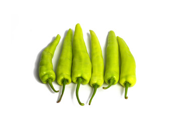 Green peppers  isolated on white background.Top view