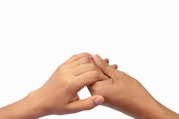 Man's hand gently holding woman's hand isolated on white background