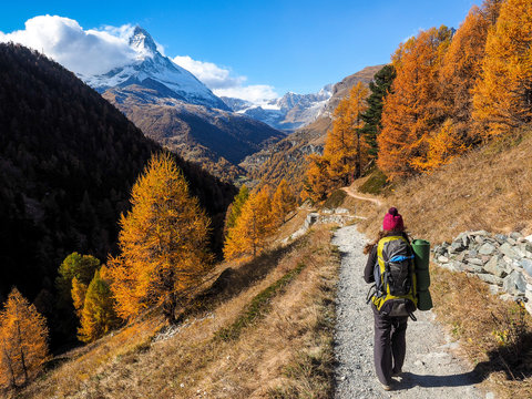 Matterhorn in early morning and trekker with outdoor equipment , Zermatt, Switzerland