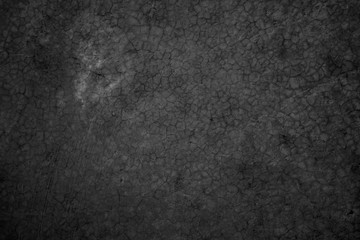 Art black concrete stone texture for background in black. Abstract color dry scratched surface wall cover colorful paper scratches shabby vintage Cement and sand grey dark detail covering.