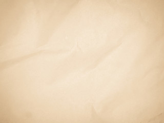 Brown recycled craft paper texture as background. Grey paper texture, Old vintage page or grunge vignette. Pattern rough art creased grunge letter. Hardboard with copy space for text.