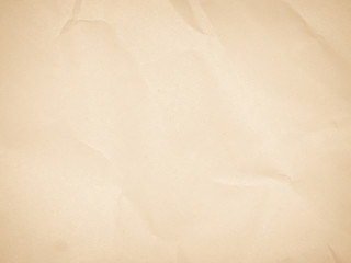 Brown recycled craft paper texture as background. Grey paper texture, Old vintage page or grunge vignette. Pattern rough art creased grunge letter. Hardboard with copy space for text.