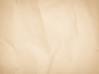 Brown recycled craft paper texture as background. Grey paper texture, Old vintage page or grunge vignette. Pattern rough art creased grunge letter. Hardboard with copy space for text.