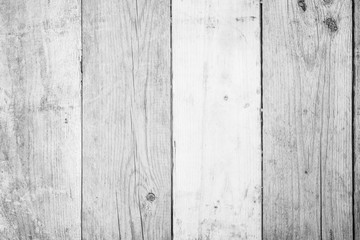 Naklejka premium Old White Wooden table texture background. Front view of vintage aged white color wood stripe vertical backgrounds texture for design as presentation, promote product or banner, ads and web concept.