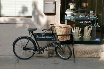 traditional delivery bike outside patisserie in Beaune in France