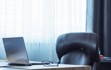 Fototapeta premium Laptop on desk in office.