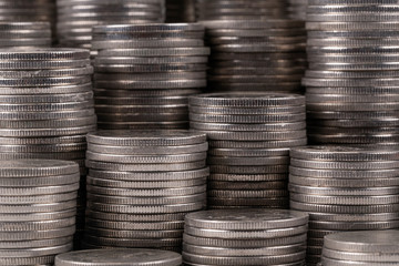 Close up of silver coin stacking in vertical row fill in frame