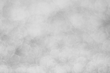 Abstract silver light bokeh blurred background