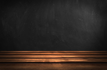 Dark room, wooden table. Empty stage with a table.