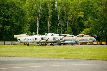 A line of retired old MI-8 helicopters