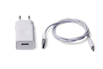 White Adapter Charger with usb cable isolate on white background.