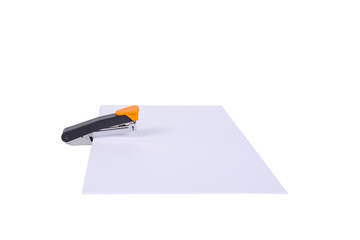 Stapler with white paper isolated on white background