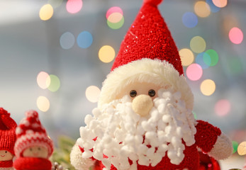 Santa Claus and lights in the background