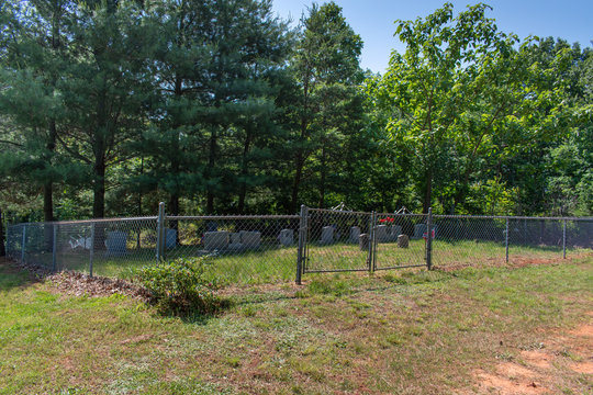A local cemetery which has the burial places of many local veterans and their family members. Photo taken in horizontal, landscape orientation. 
