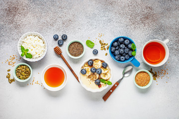 Healthy breakfast set with tea and granola. Top view. Flat lay