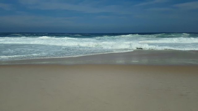 A little bird appears 4s and went away 7s. Itacoatiara Beach, Brazil.