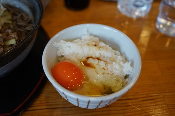 close up egg on rice bowl