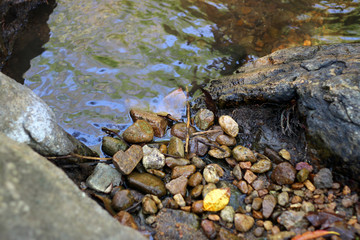 smooth clear water float on stone,rock water movement