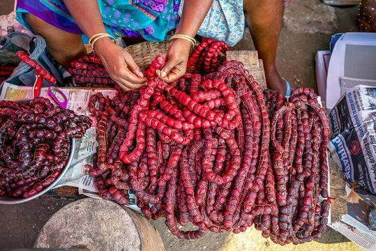 11/15/2019 India, Mapusa, GOA, Goa&rsquo;s pork sausages trading in the traditional grocery market. Goan sausage is a typical reflection of Indo-Portuguese cuisine. Spontaneous market concept