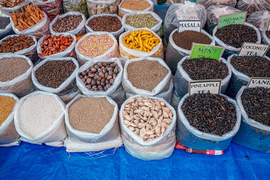 11/15/2019 India, Mapusa, GOA, selling spices and spices in the traditional grocery market. The concept of spontaneous market and residential pollution and overpopulation poverty